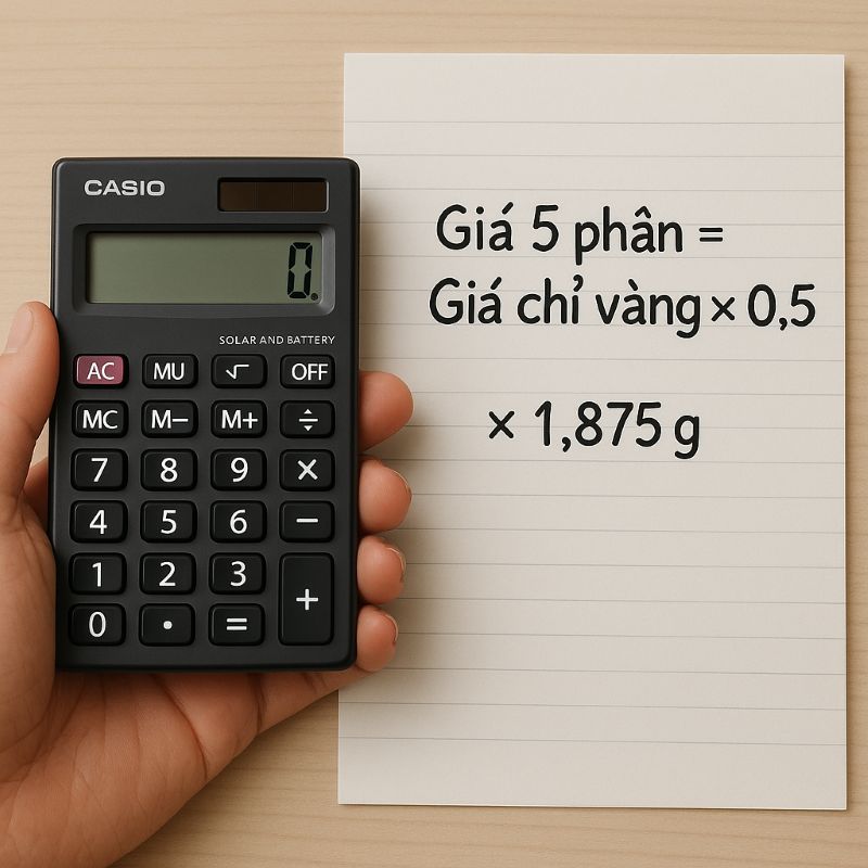 Tay tính giá vàng bằng máy tính và sổ tay ghi công thức
