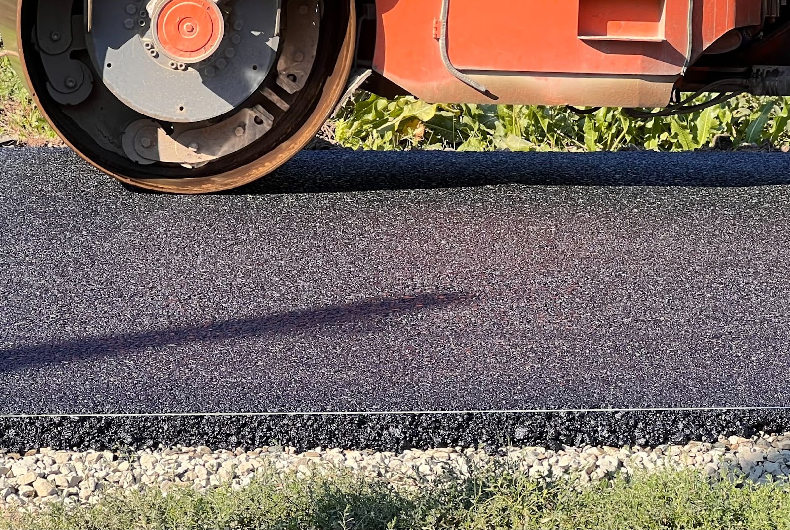 Close view of an asphalt paver. 