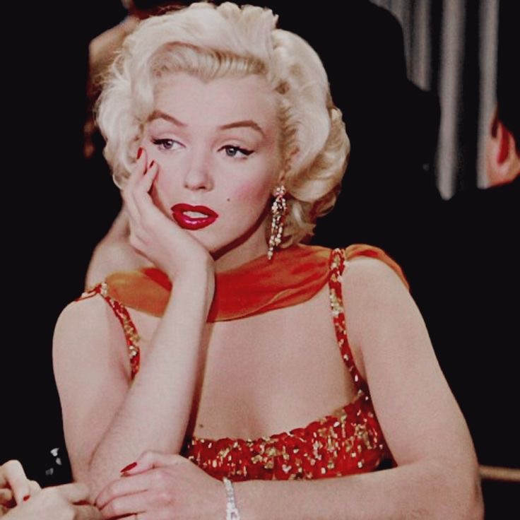 Alt text: An iconic image of Marilyn Monroe, exuding classic Hollywood glamour via NYTimes.com