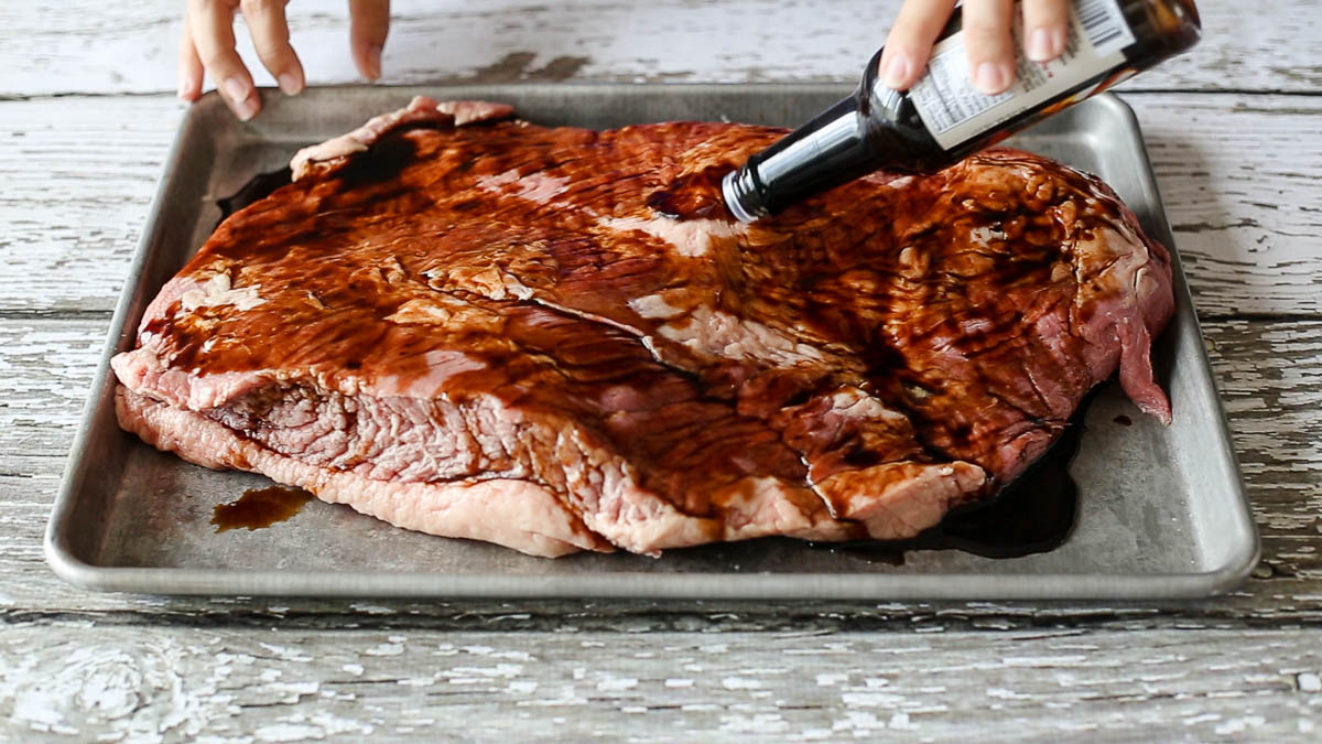 Saturate beef brisket with marinade prior to vacuum sealing