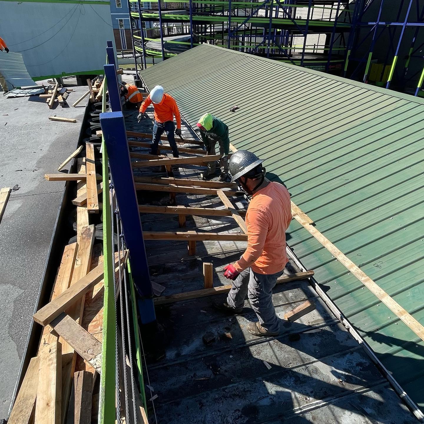 Workers repairing the roof