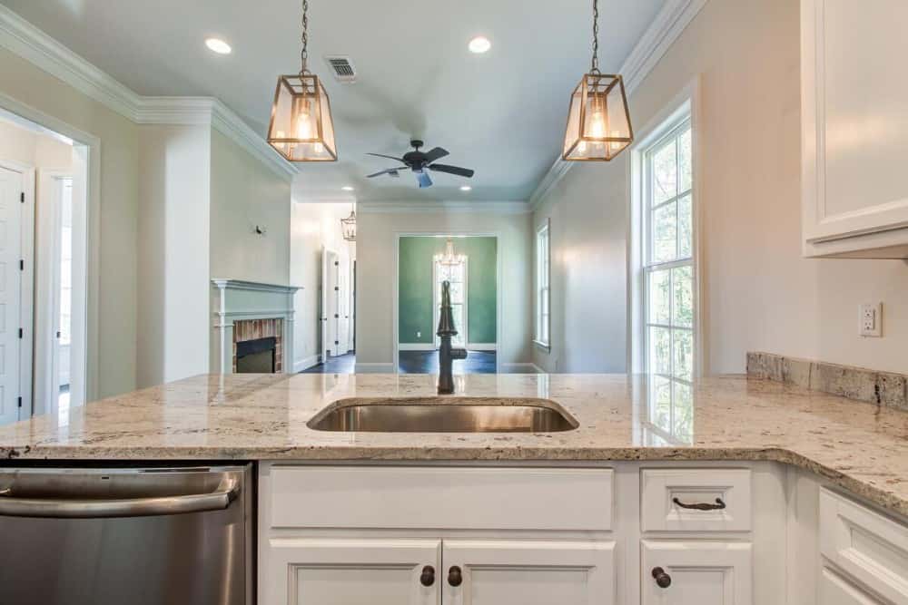 View of the living area and foyer from the kitchen.
