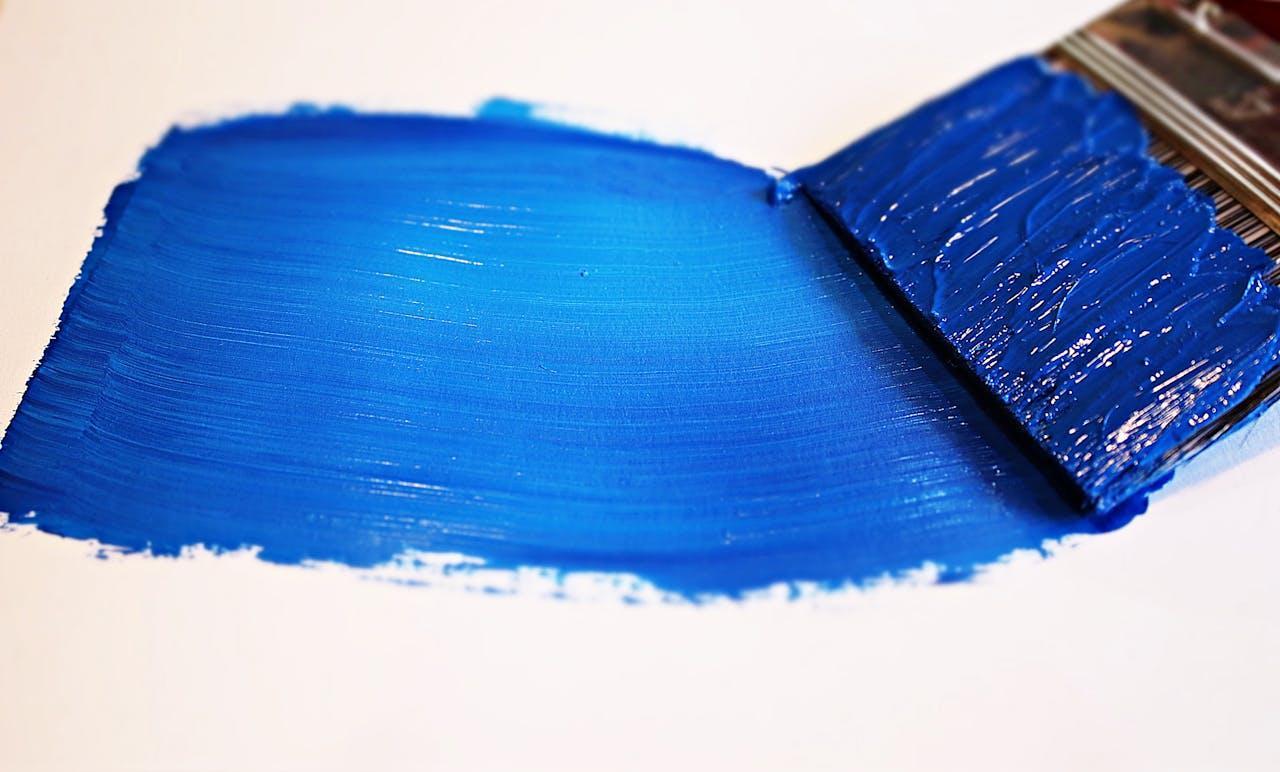 Blue paint on white surface