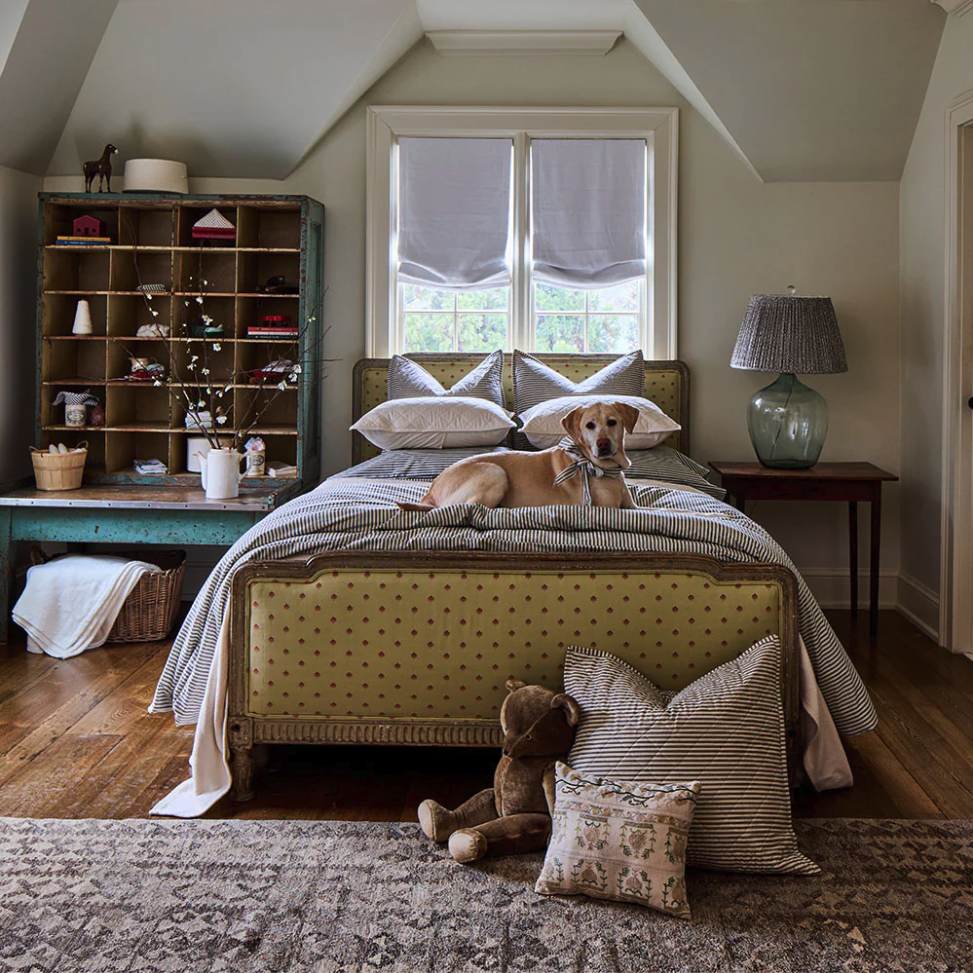 Ticking stripe pattern still brings a grounded, honest character to the spaces we live in.
