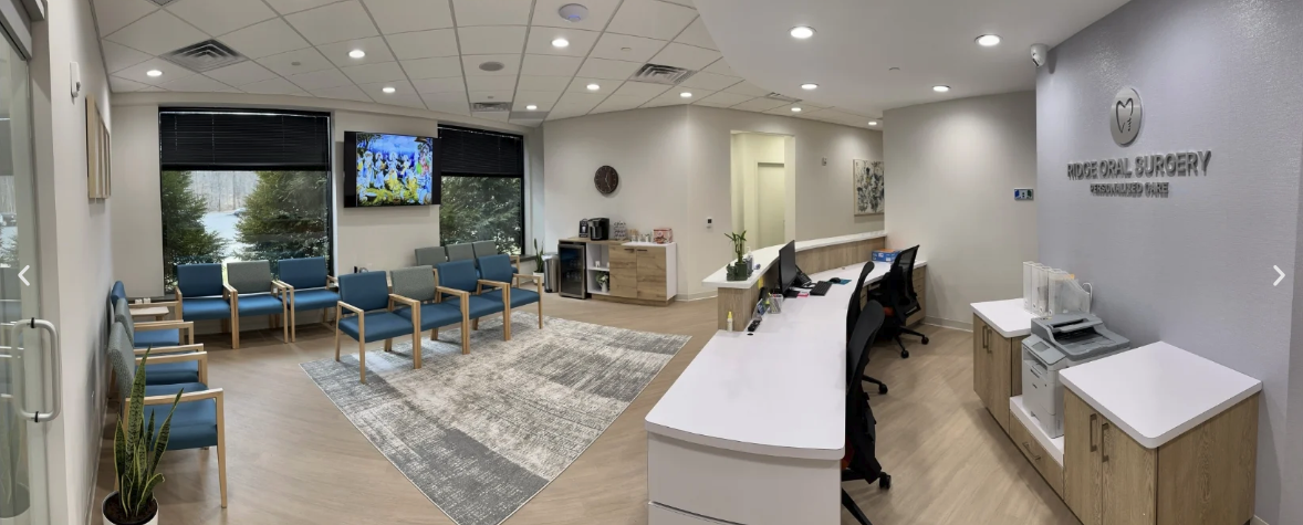 The waiting room at Ridge Oral Surgery is modern and welcoming, offering a comfortable space for patients before their appointments.