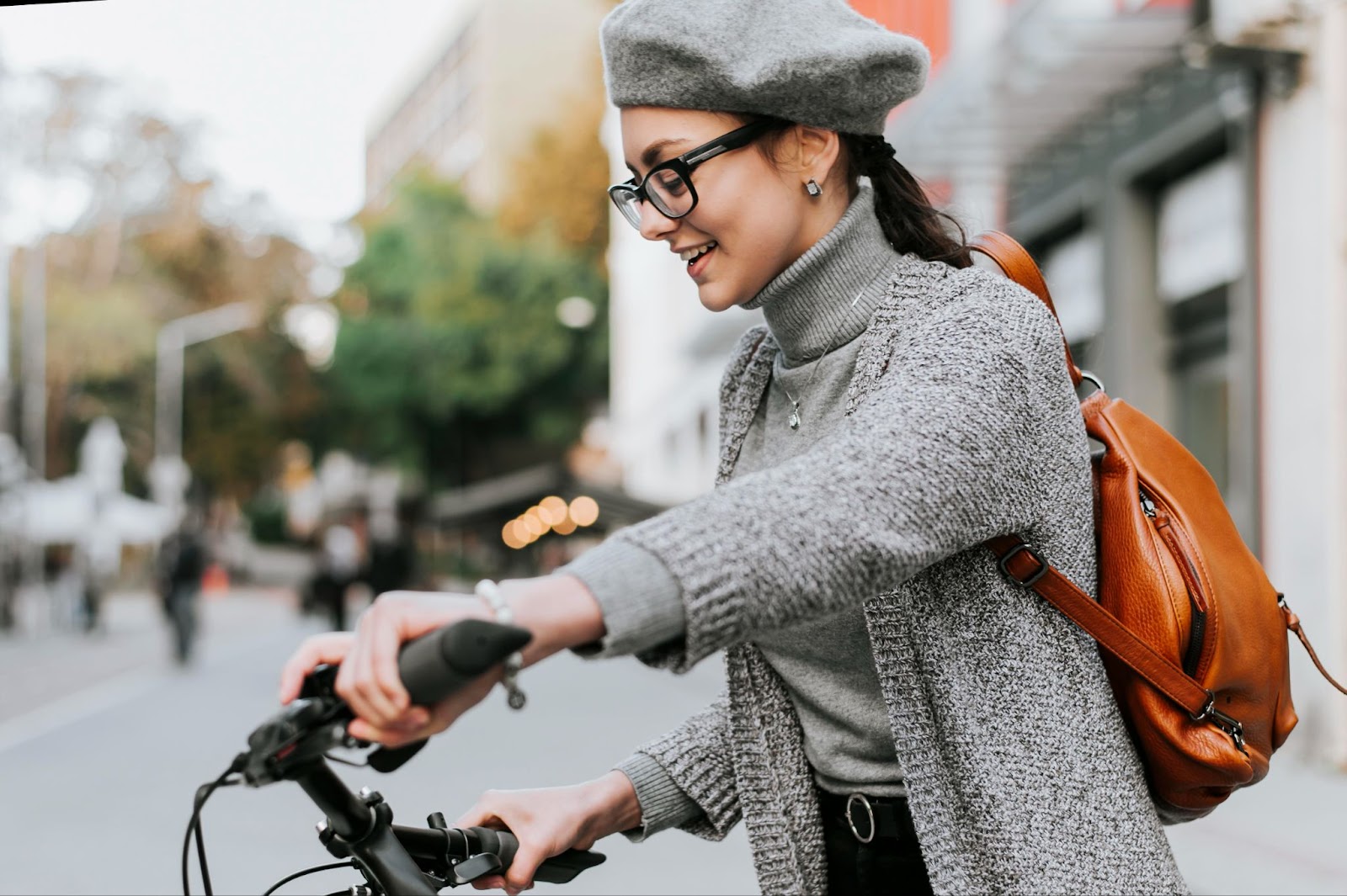 A young woman on her electric bike during a customized guided tour of Paris.