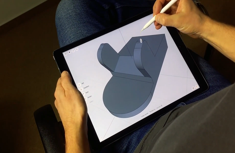 
Person designing on a tablet.













