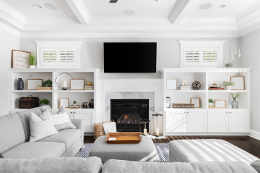 winter interior remodeling ideas to make your home warm and inviting living room with built in shelving next to tv and fireplace custom built michigan