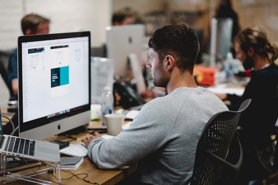 imgTeam members in a meeting exploring how AI-integrated search tools enhance data accessibility and streamline information retrieval in enterprise settings