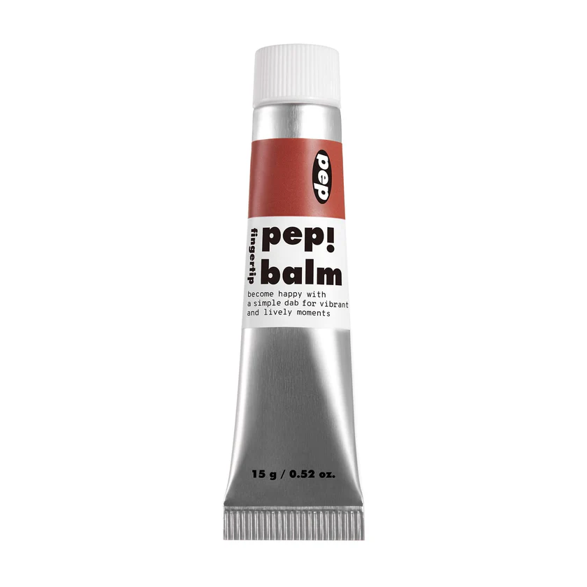 Silver metal tube of pep! balm with red and white label, designed for multitasking lip and cheek color.