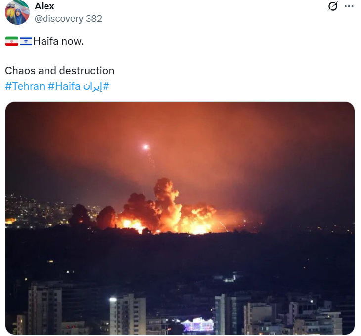 A photo claiming to show flames and smoke rising in Haifa, Israel, following a massive Iranian missile strike that allegedly caused chaos and destruction.