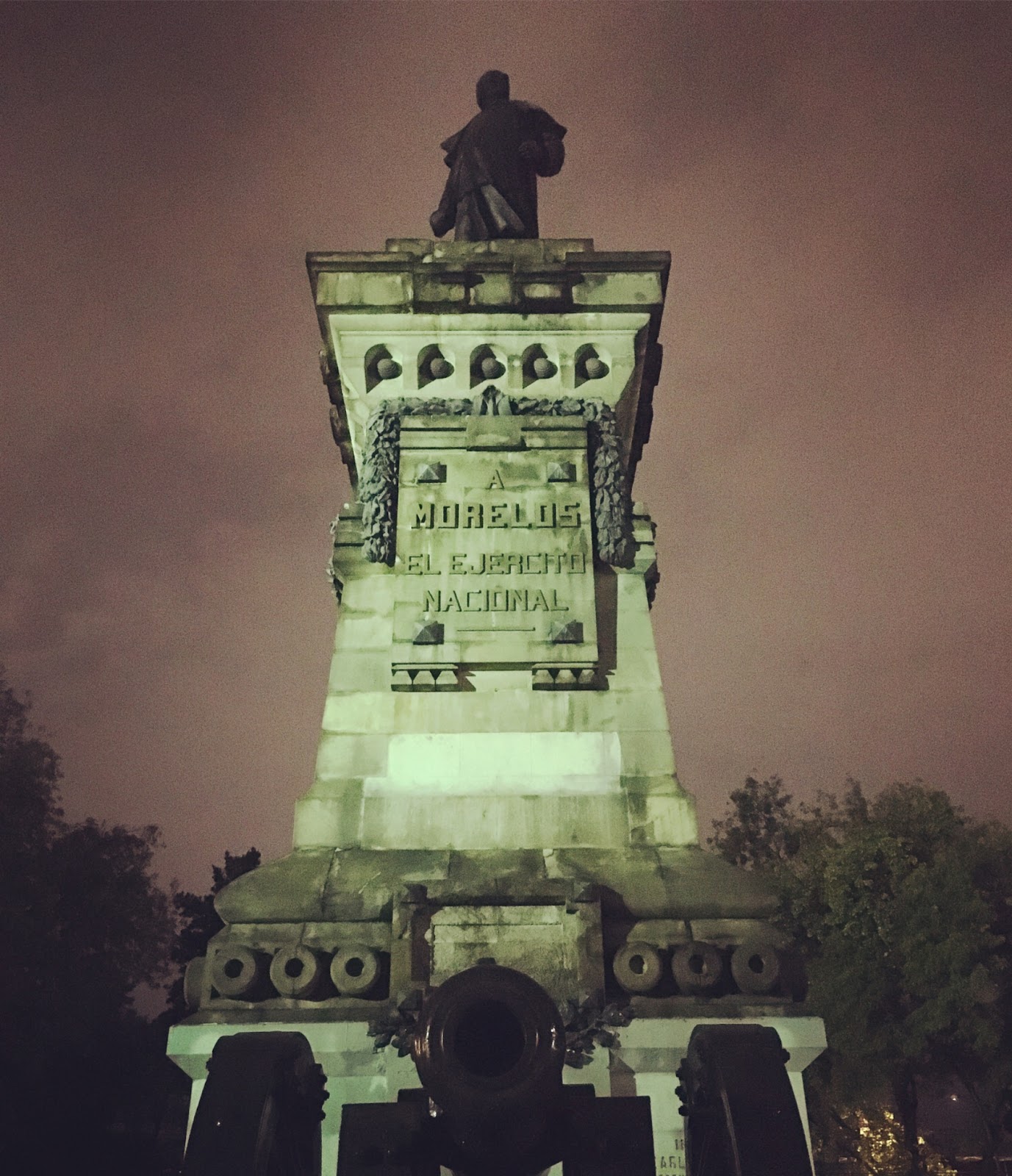 statue in the park of La Ciudadela in Mexico city where gay cruising males come at night to suck and fuck and have bareback sex in gay park cruising hookups