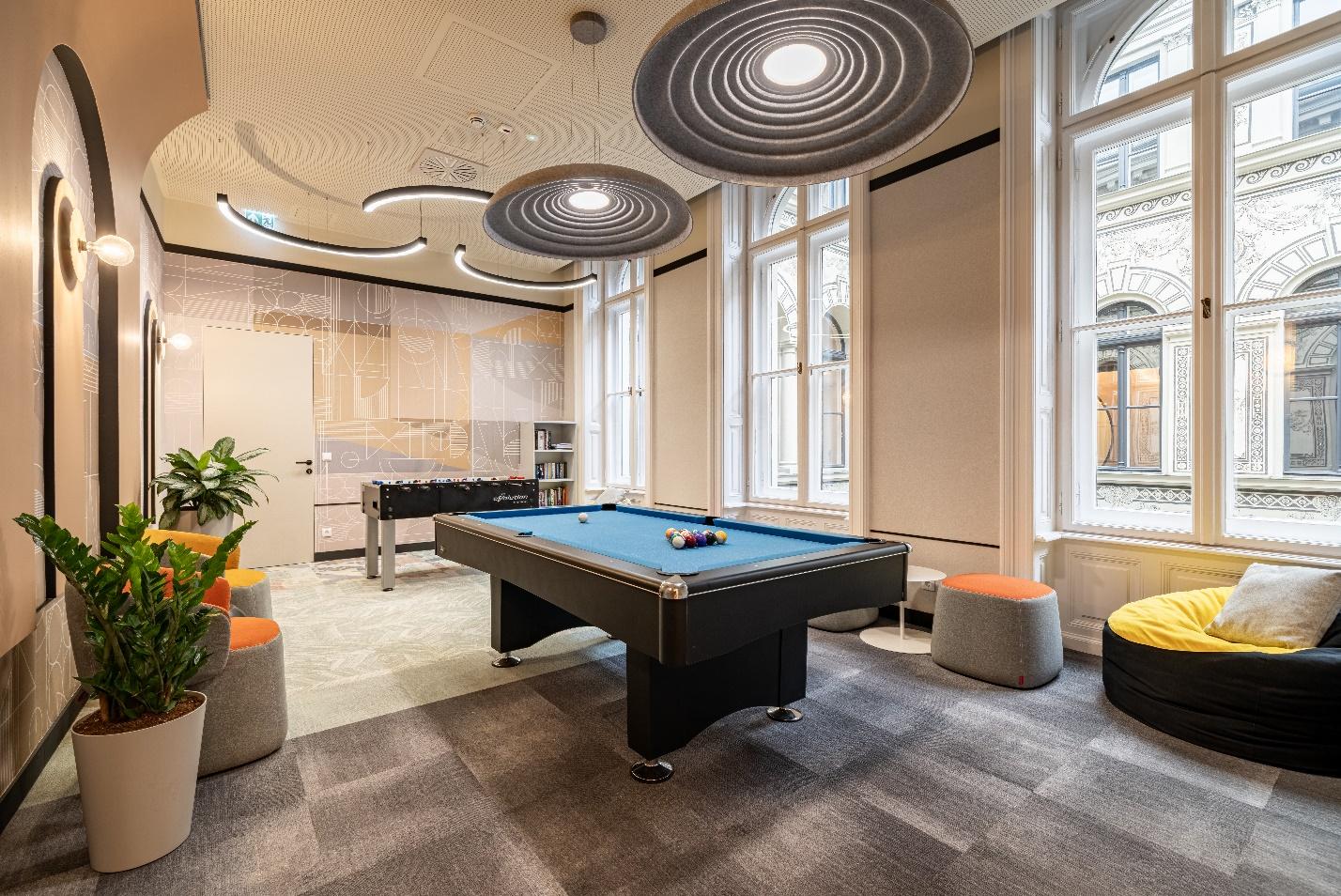A pool table in a roomAI-generated content may be incorrect.