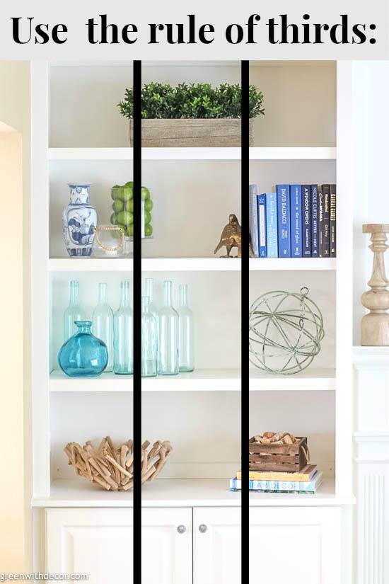 a white shelf with shelves and objects on it