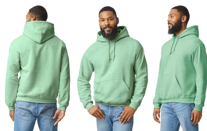  The back, front and side view of the Gildan 185000 Adult Heavy Blend™ 8 oz., 50/50 Hooded Sweatshirt in the color “mint green”.