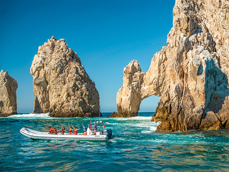 Boat under rock arches