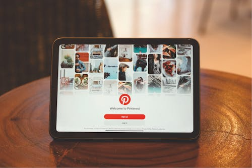 dashboard open on an iPad screen showcasing visual boards and search tools