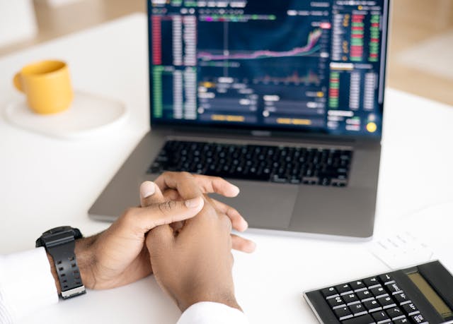 Person looking at stocks on computer