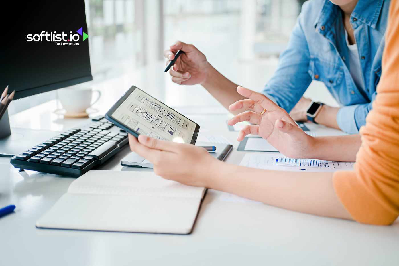 a woman holding a tablet