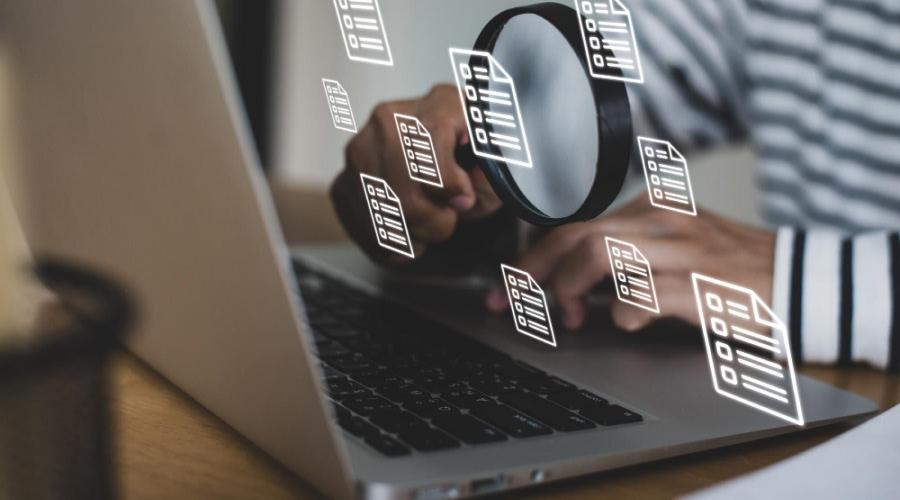 A person looking at a magnifying glass

AI-generated content may be incorrect.
