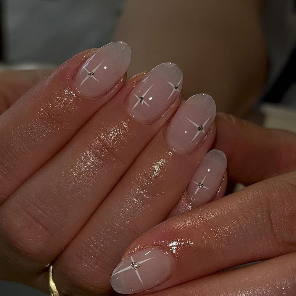 Simple White Nail Design having Star Nails