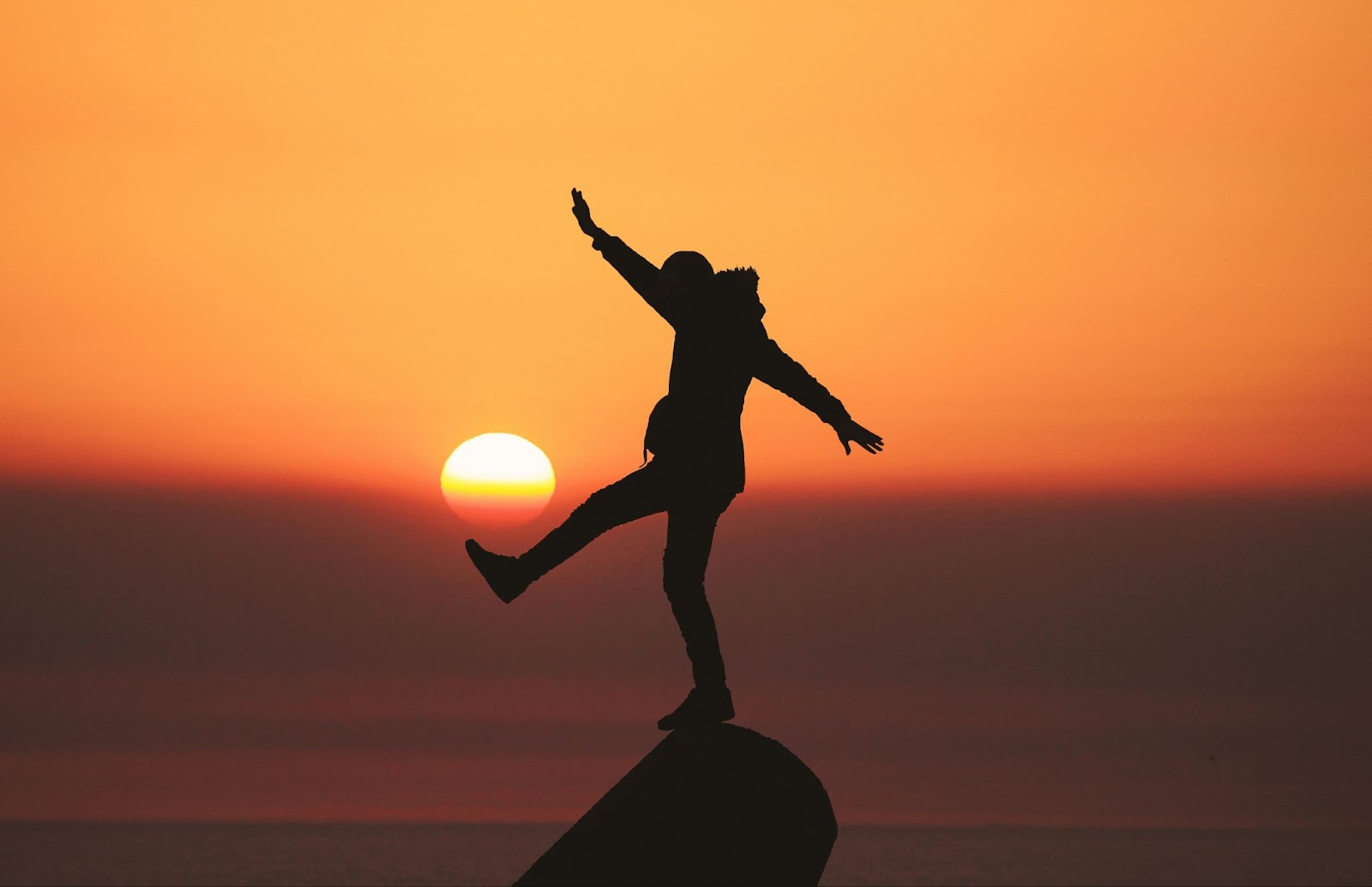 Collard Spiritual Direction - Seeing with our Souls - Image of person balancing on stone by Aziz Acharki via Unsplash