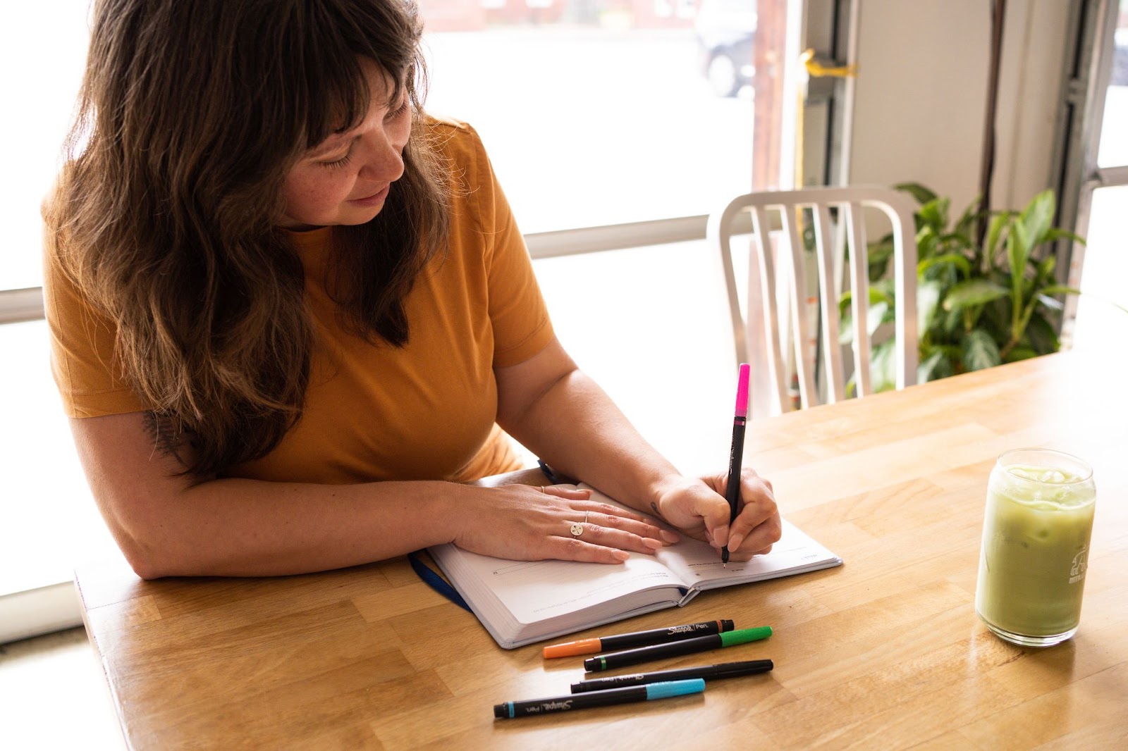 woman writing her values