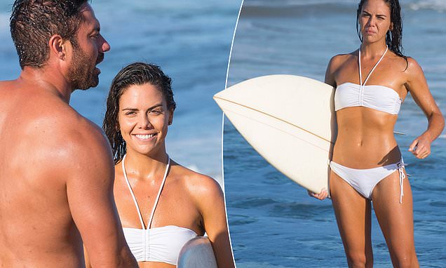Home and Away actress Emily Weir sizzles in a white bikini on set for beach  scene | Daily Mail Online