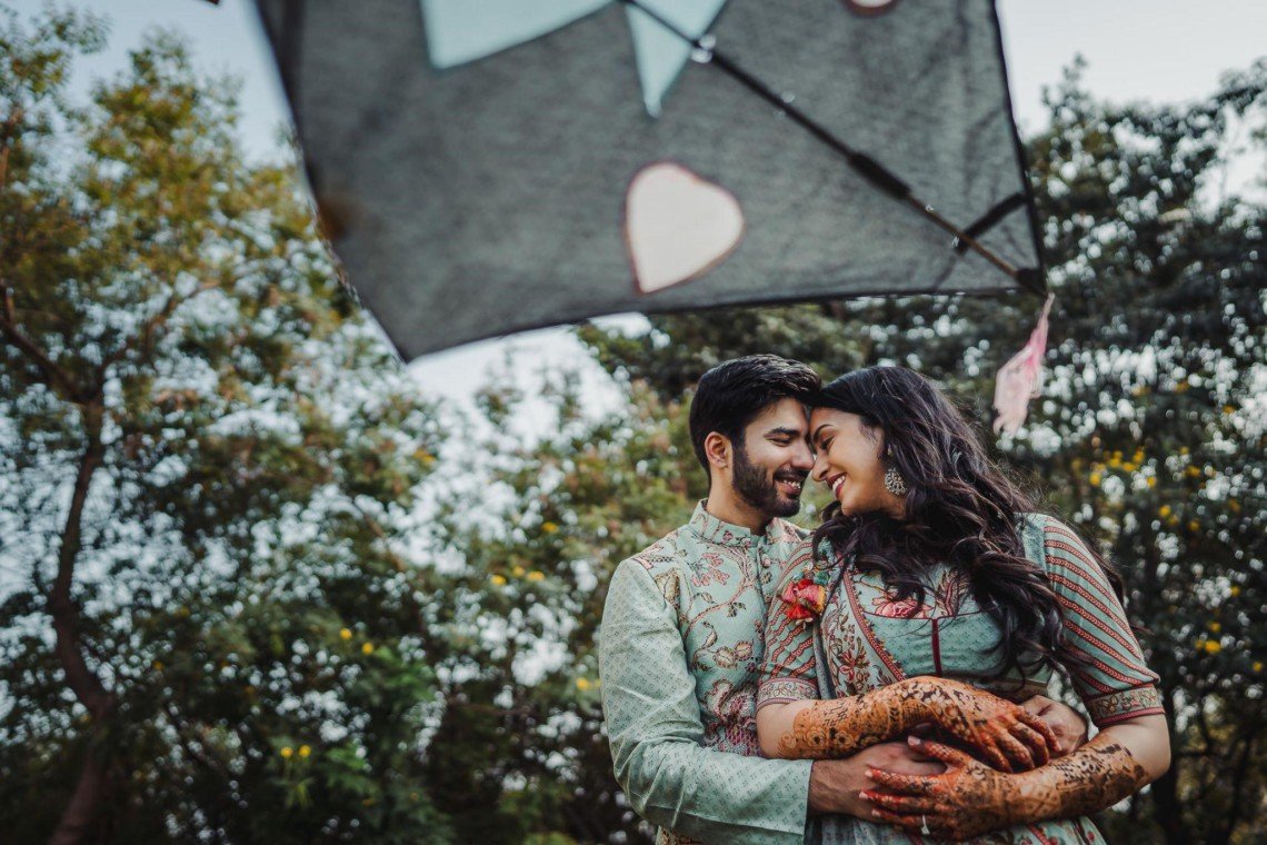 Timeless pre-wedding photoshoot at Taramati Baradari, with a couple basking in the warm sunset light