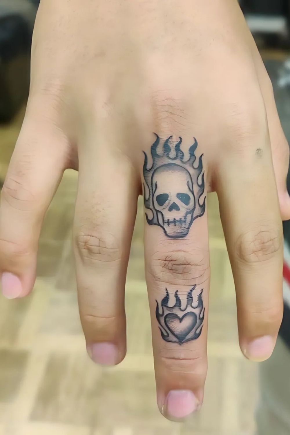 Skull Finger Tattoo