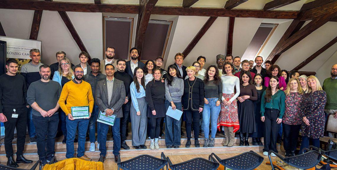 A group of people posing for a photo

AI-generated content may be incorrect.