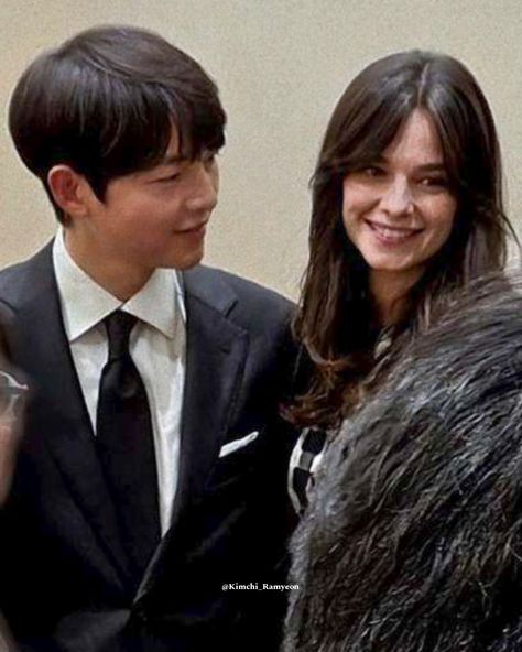 This contains an image of Song Joong Ki and Katy together.
