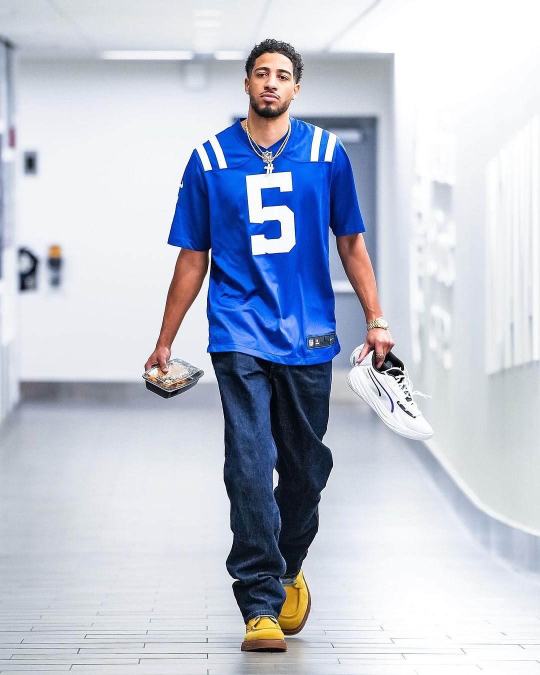 Photo shared by LeagueFits on November 17, 2024 tagging @pacers, @colts, @tyresehaliburton, and @blitzfits. May be an image of 1 person, playing football, football helmet, sportswear and text.