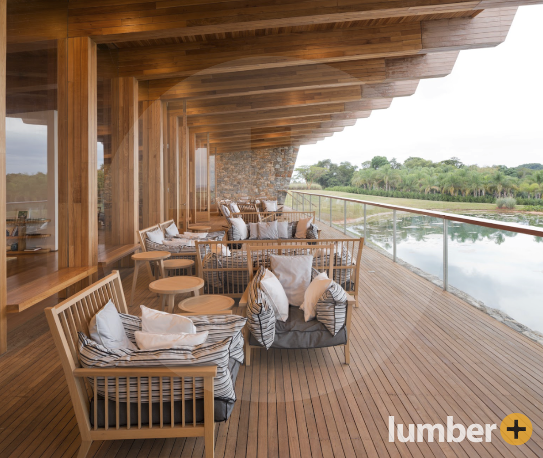  a commercial building design idea with a lakeside deck and wood overhang