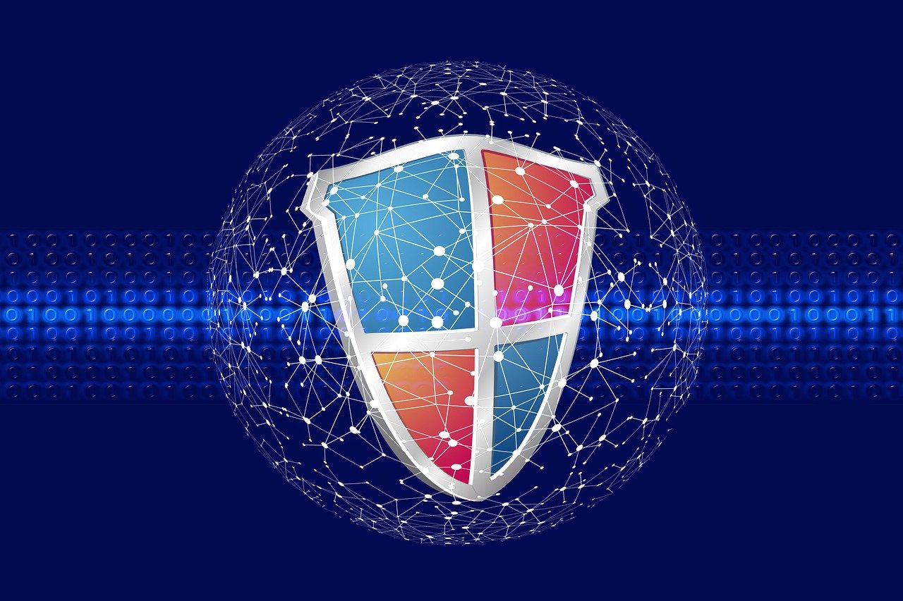 A digital shield with interconnected lines and nodes, set against a blue background with binary code and a glowing light pattern.