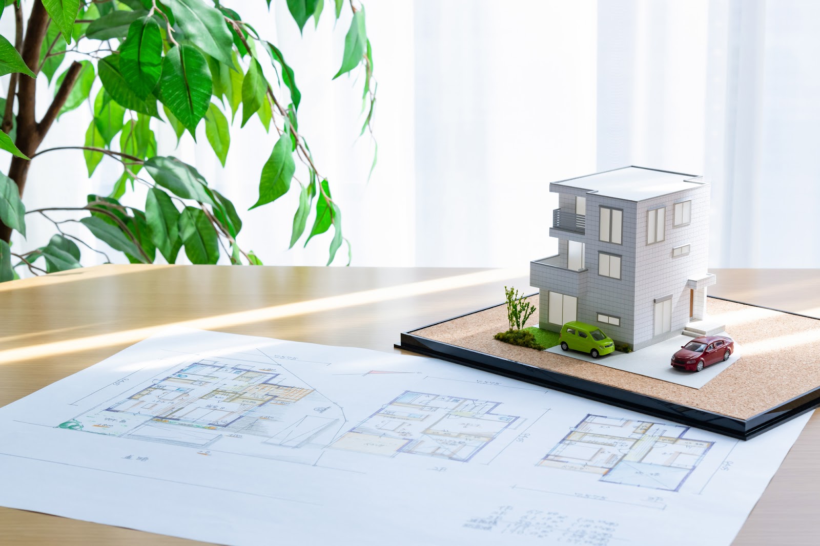 二世帯住宅の模型と間取り図｜注文住宅の設計プランニング風景