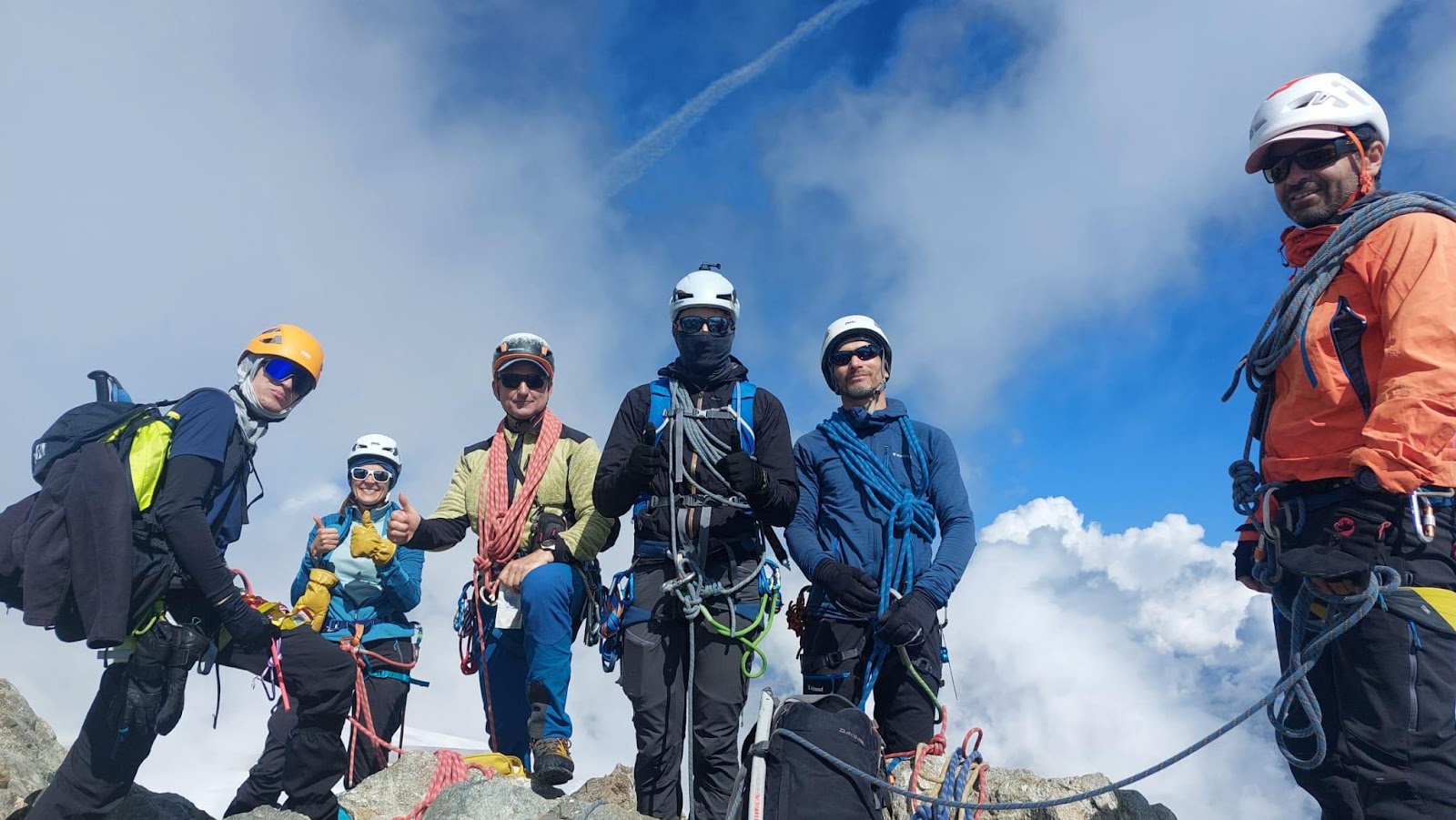 A group of people posing for a photoAI-generated content may be incorrect.
