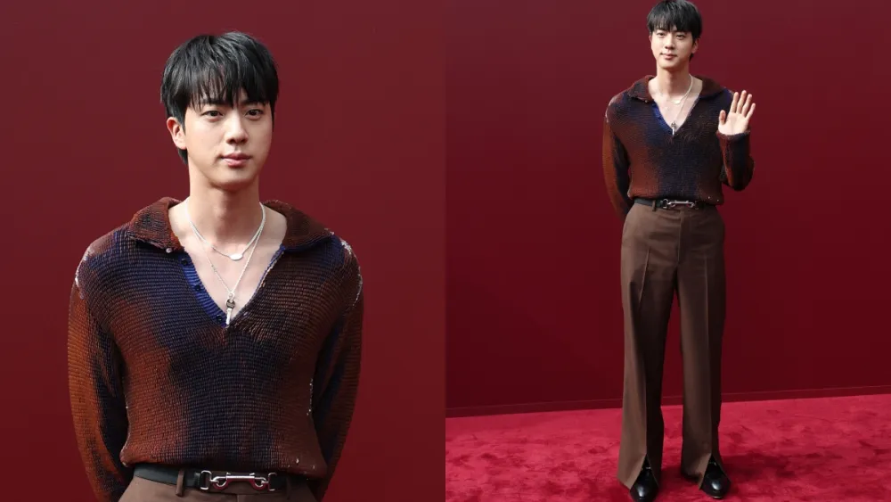 Close-up of Jin's accessories and Gucci styling