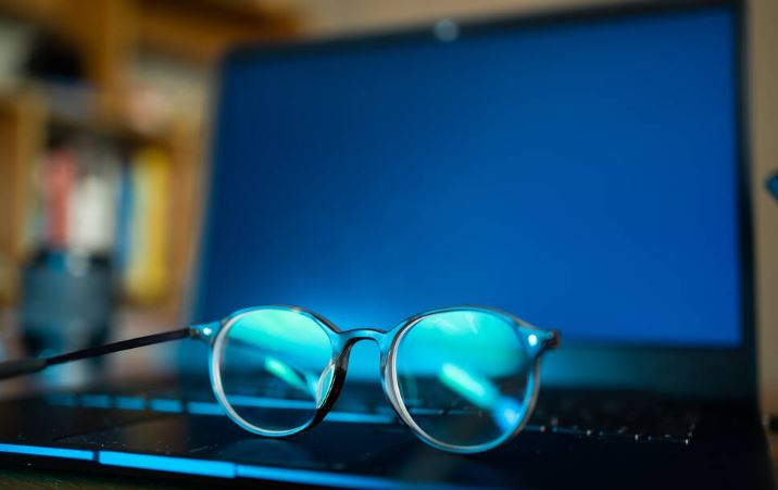 Glasses placed on a laptop