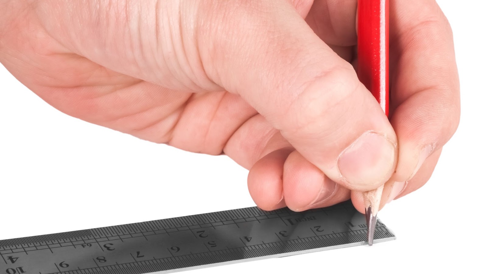 An image of a man using a metal ruler