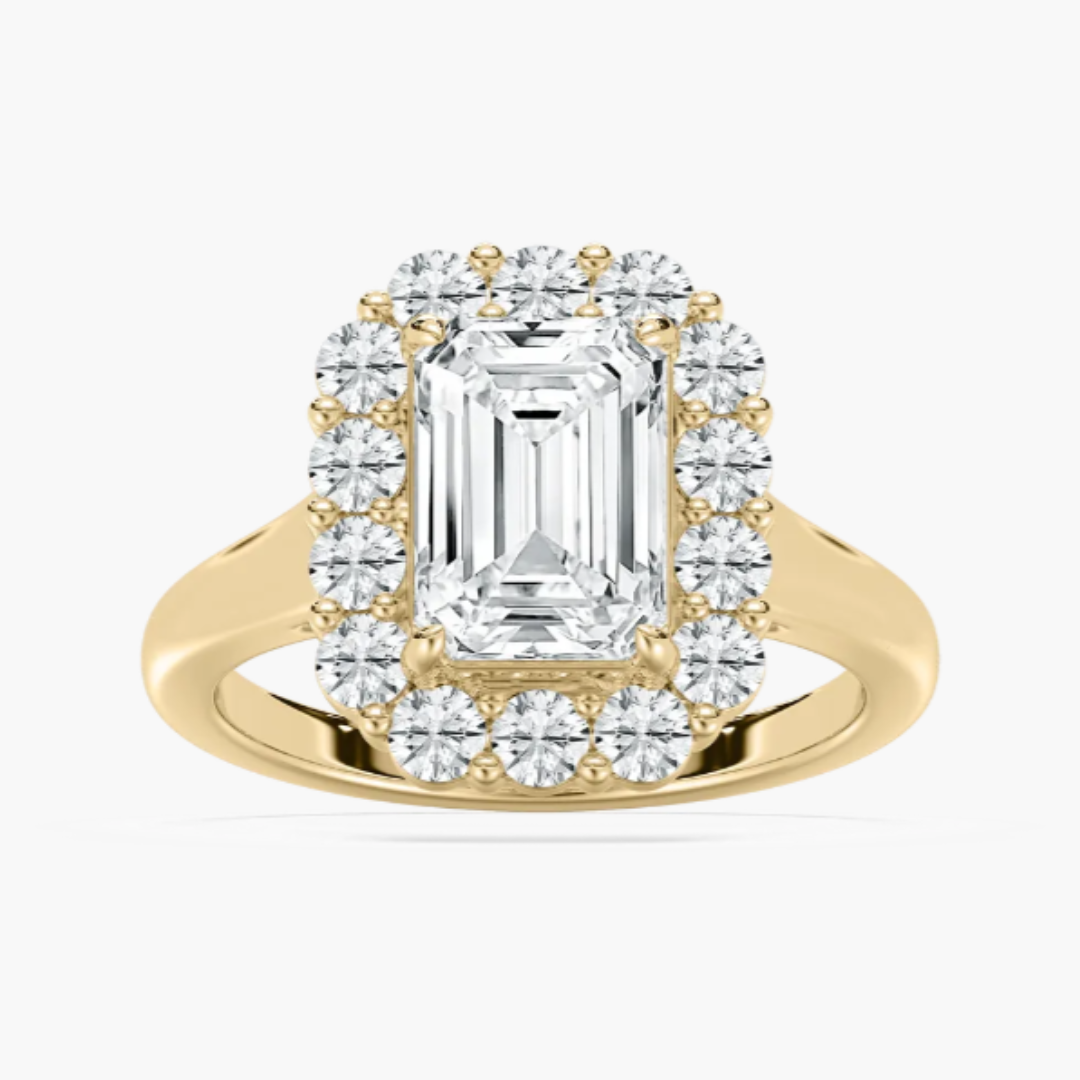 Emerald lab-grown diamond yellow gold halo engagement ring suitable for wedding ceremony wearing.
