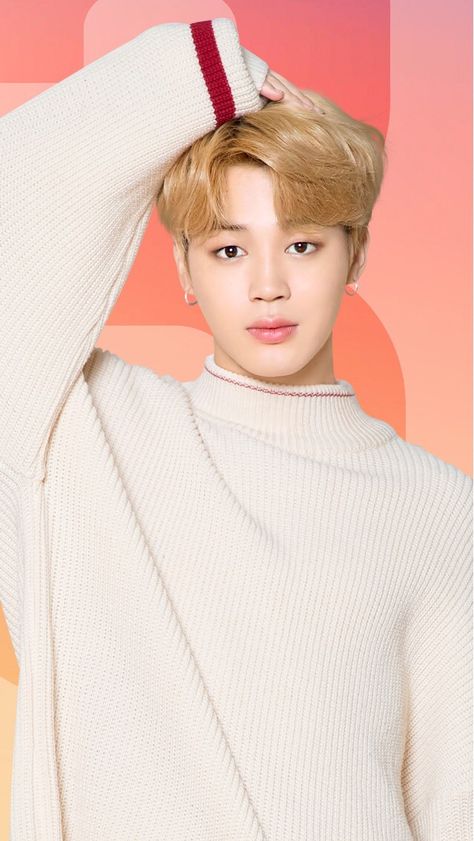 A picture of BTS Jimin on white cloth with one of  his hand on his head 