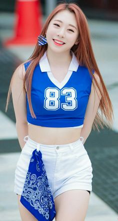 WJSN_Yeonjung wearing a blue crop top and a white short 