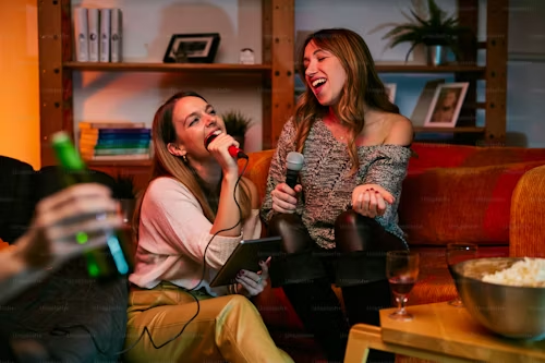 two girls singing in karaoke