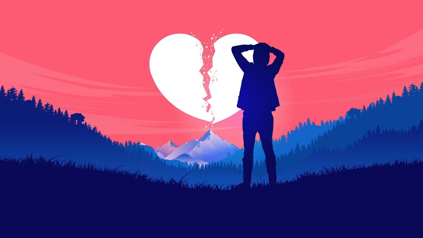 A person standing in front of a broken heart

Description automatically generated