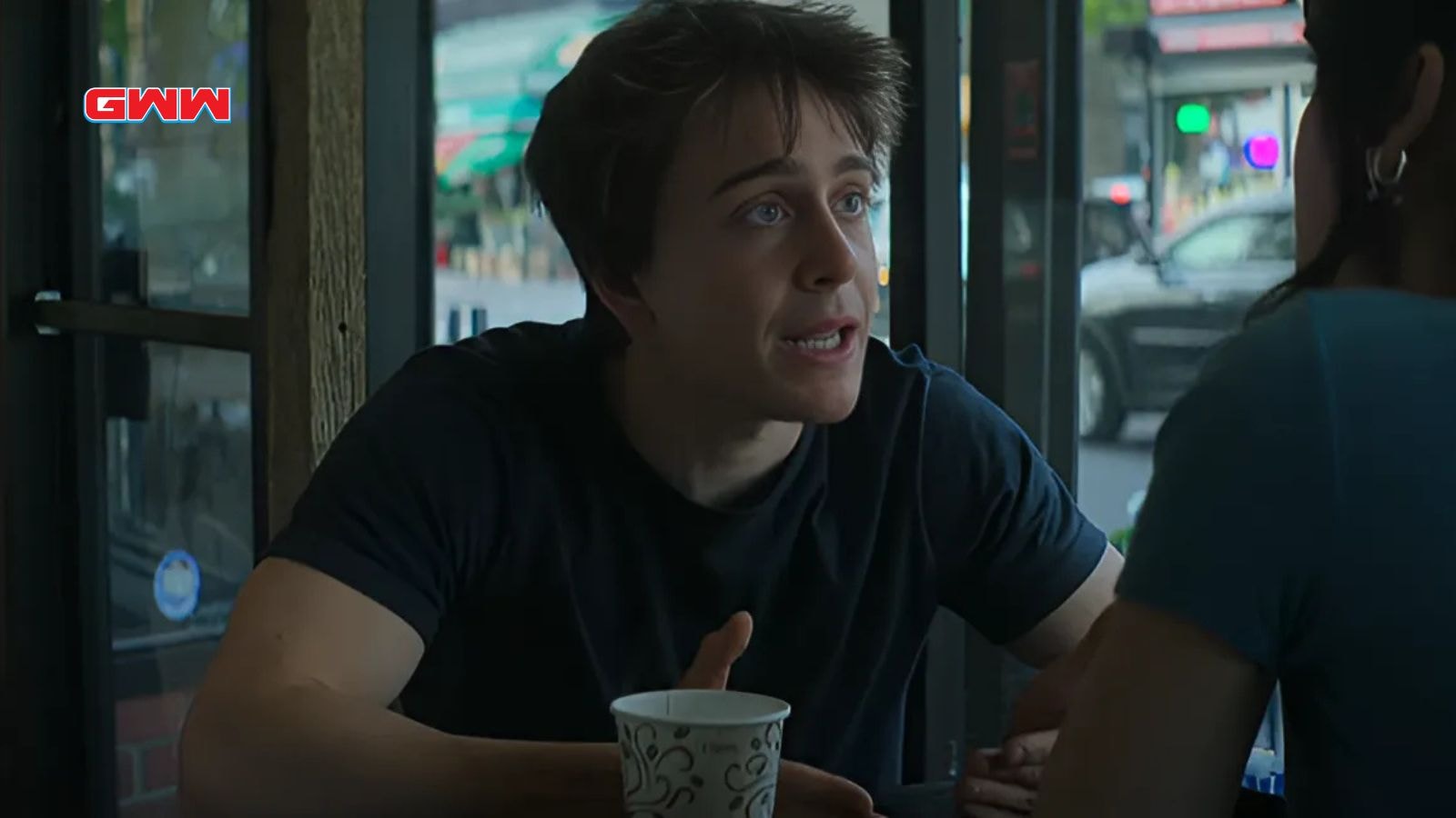 Sam McCarthy discussing in a cafe in Goosebumps Season 2