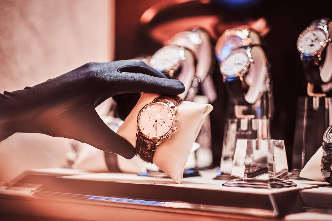 A luxury wristwatch placed on a tuxedo, symbolizing elegance and style for formal events and special occasions.