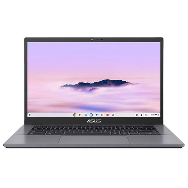 A computer with a pink and purple sky

Description automatically generated