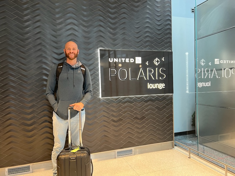 Standing at the entrance of the United Polaris Lounge in ORD airport. 