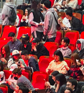 This contains an image of  Stray Kids' Changbin, Seungmin, Han, and Hyunjin
 at 2NE1 concert